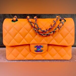 Slightly used Chanel orange with dust bag